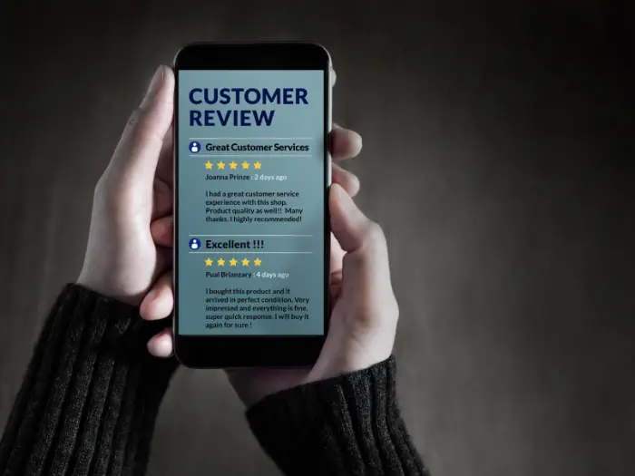 Customer Experience and Online Review Concept. Female holding SmartPhone to Reading Customer Review before Buying Products