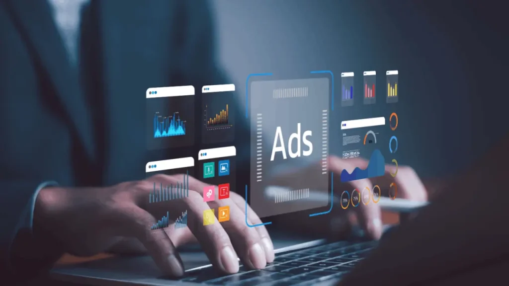Law firm marketing professional managing digital ads campaigns and analytics dashboards on a laptop