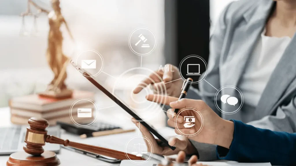 Local search visibility for legal practices — attorney using digital tablet with legal technology icons and Lady Justice statue
