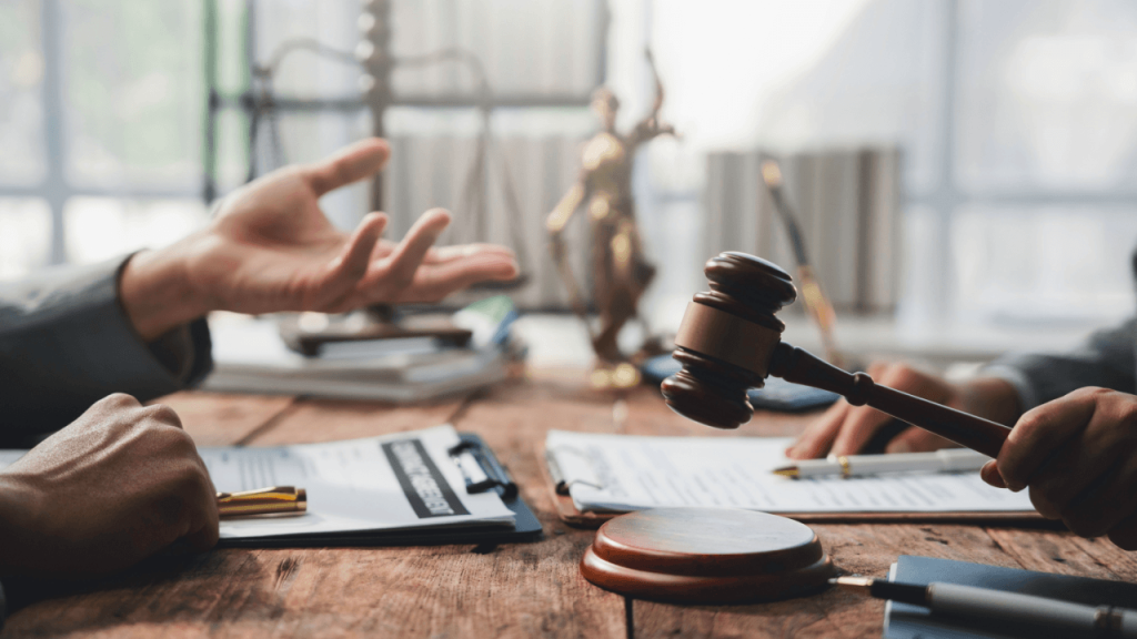 Criminal defense attorneys discussing lead generation costs at a law firm meeting