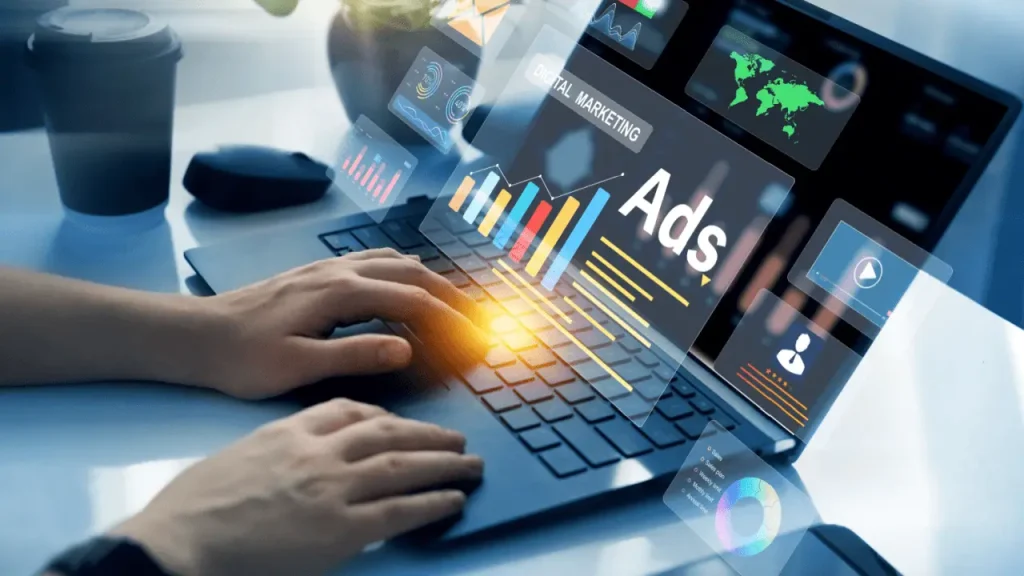 Law firm digital marketing professional managing online ads campaigns and analytics on a laptop