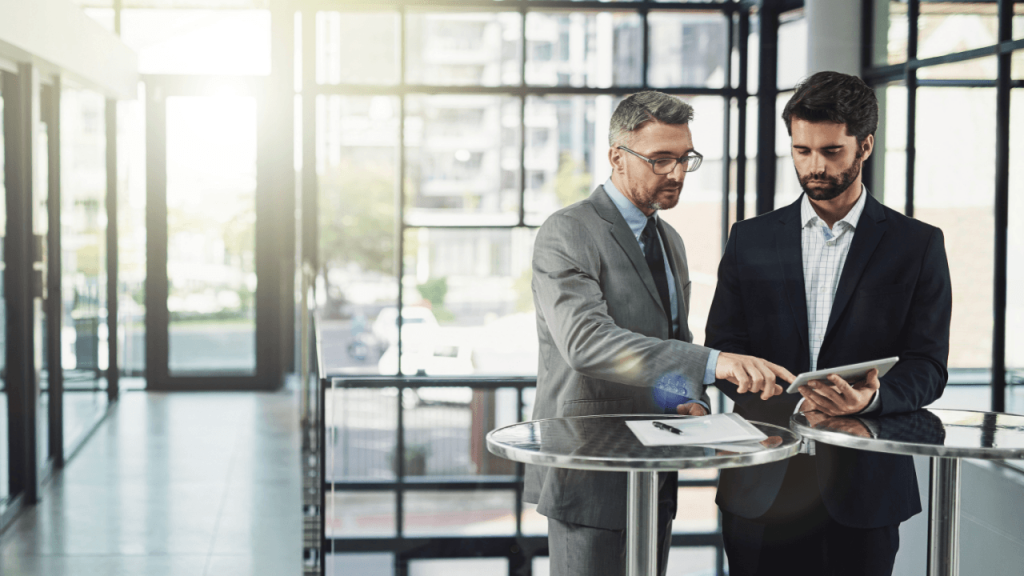 Legal Leads Cost – businessman pointing to lead generation magnet icon with digital marketing symbols
