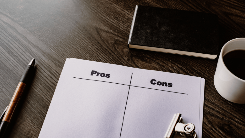 Pros and cons worksheet on clipboard for attorney lead evaluation