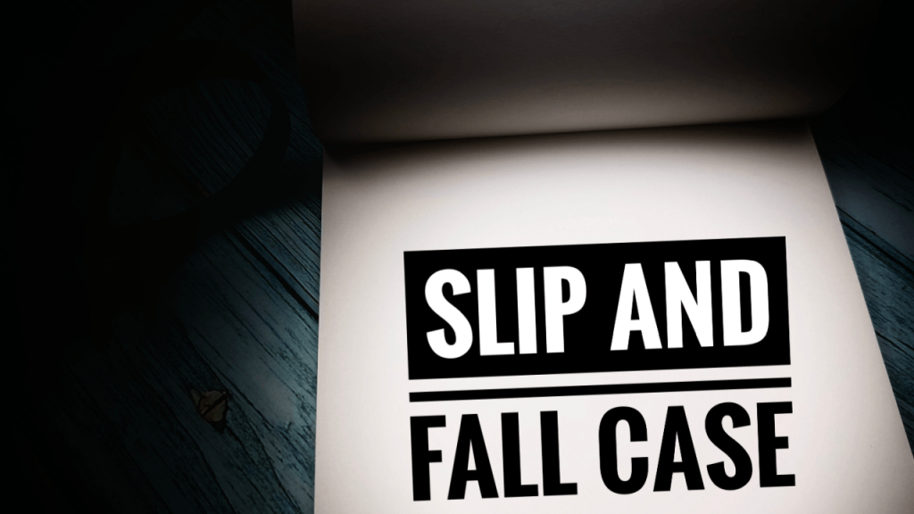 Slip and fall case document on a wooden surface
